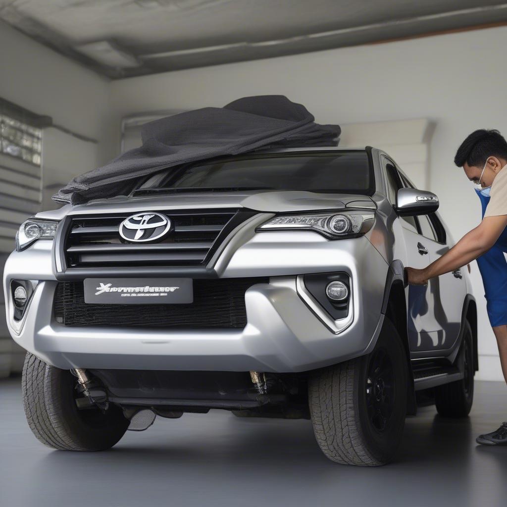 Lắp đặt ốp cốp sau Fortuner tại nhà