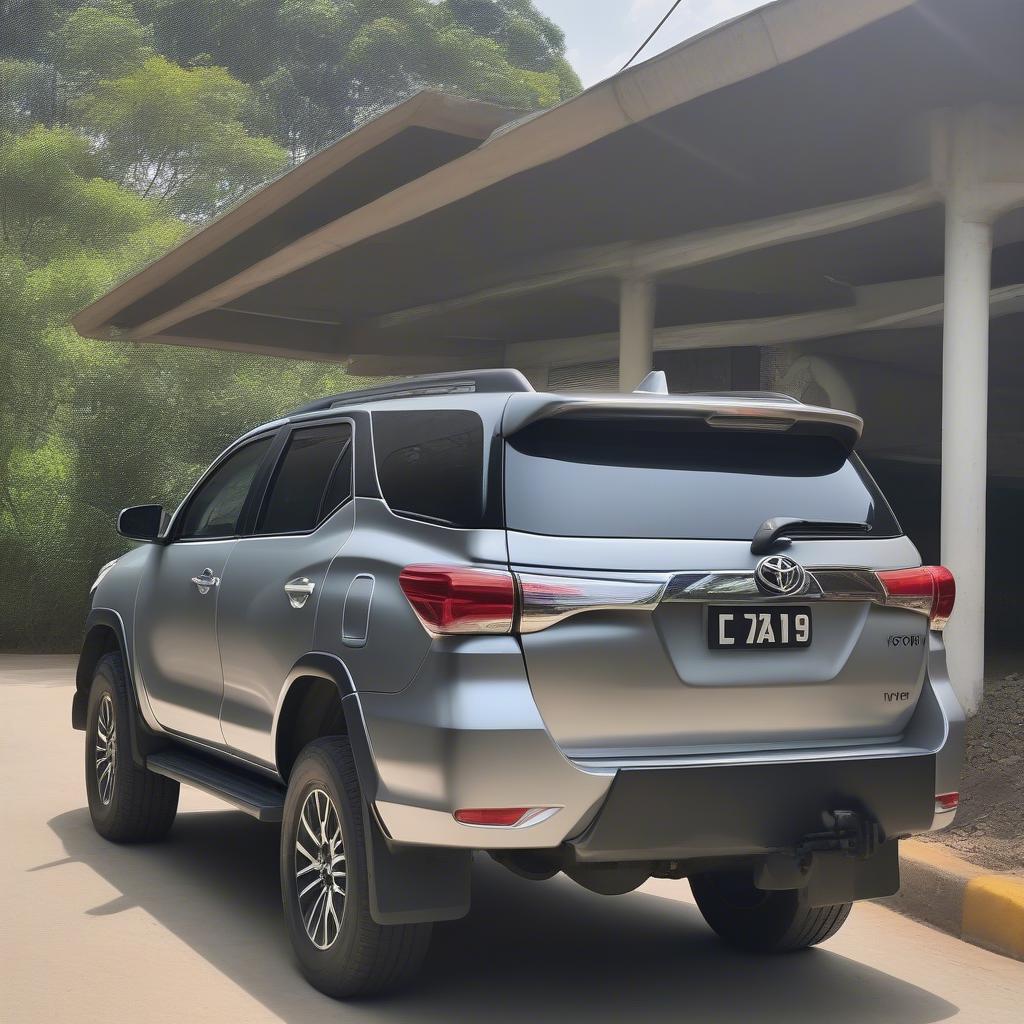 Vị trí số khung xe Fortuner 2016 trên khung gầm, gần bánh trước bên phải, được làm nổi bật để dễ dàng quan sát.