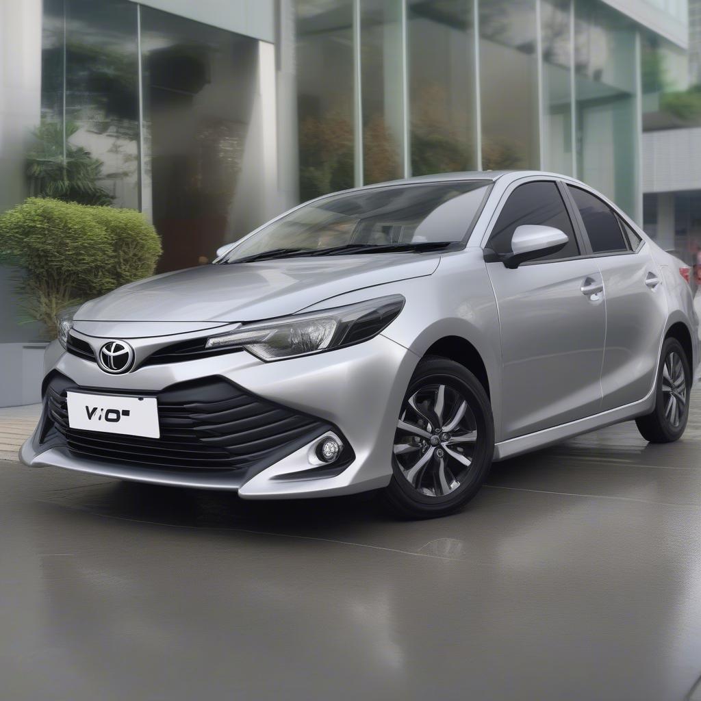 Toyota Vios 2020 màu bạc sang trọng đậu trước showroom Toyota